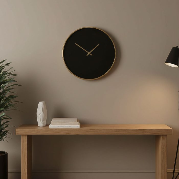 Orologio da parete nero e oro design minimal - immagine 2
